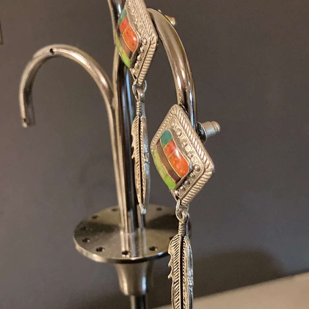 Silver tone and enamel drop feather earrings